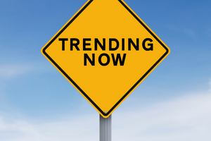 Road sign that says trending now