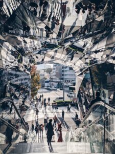 image of a busy street that is juxtaposed in a cubist type way
